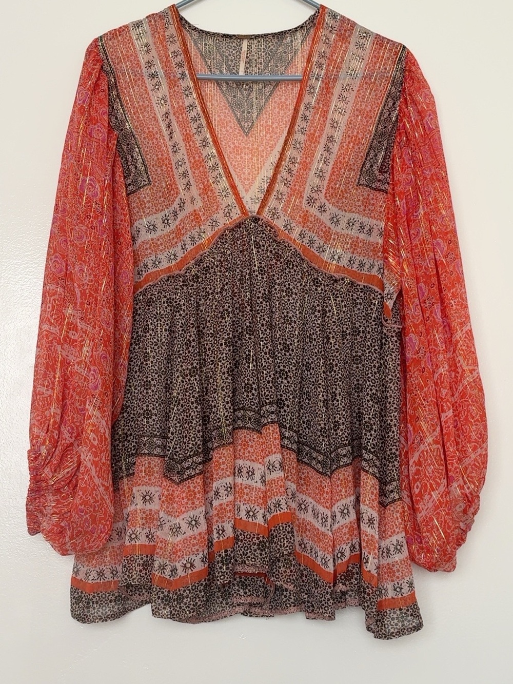 Free People Mixed Print V-Neck Peasant Tunic in Orange and Black